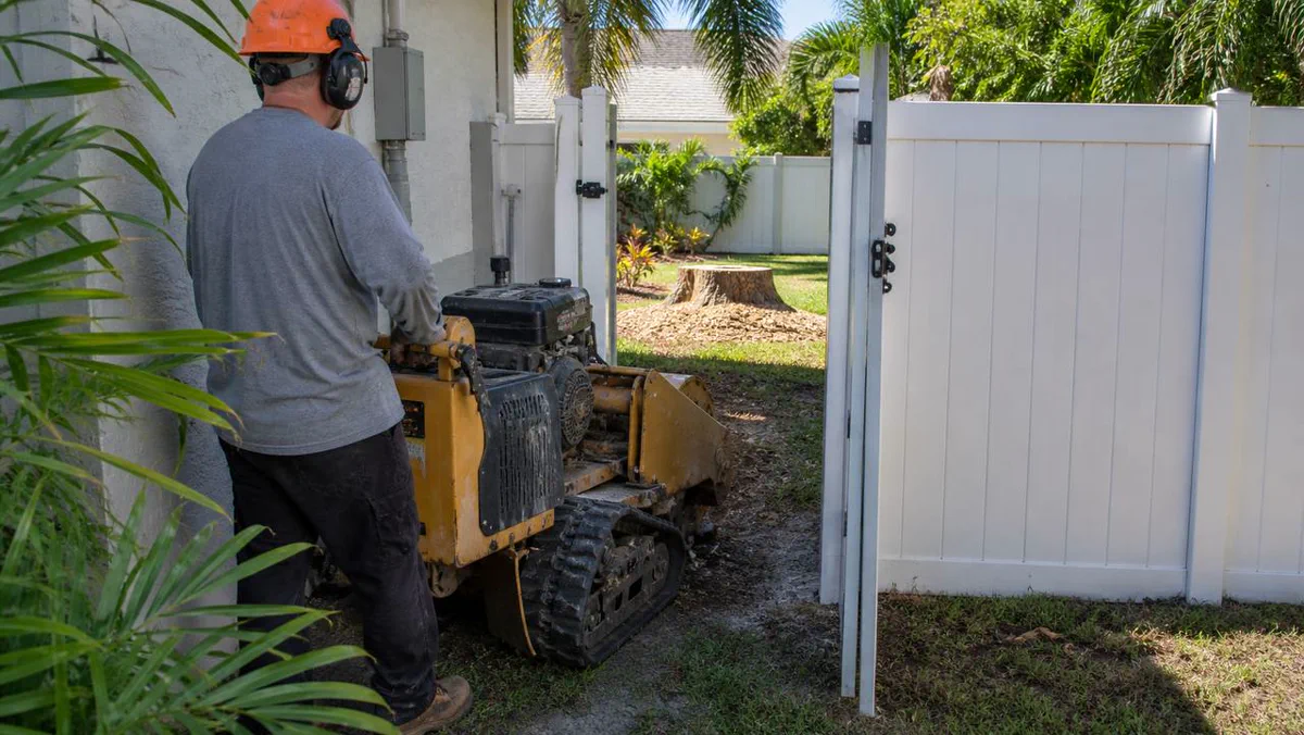 Backyard stump grinding access in Melbourne FL